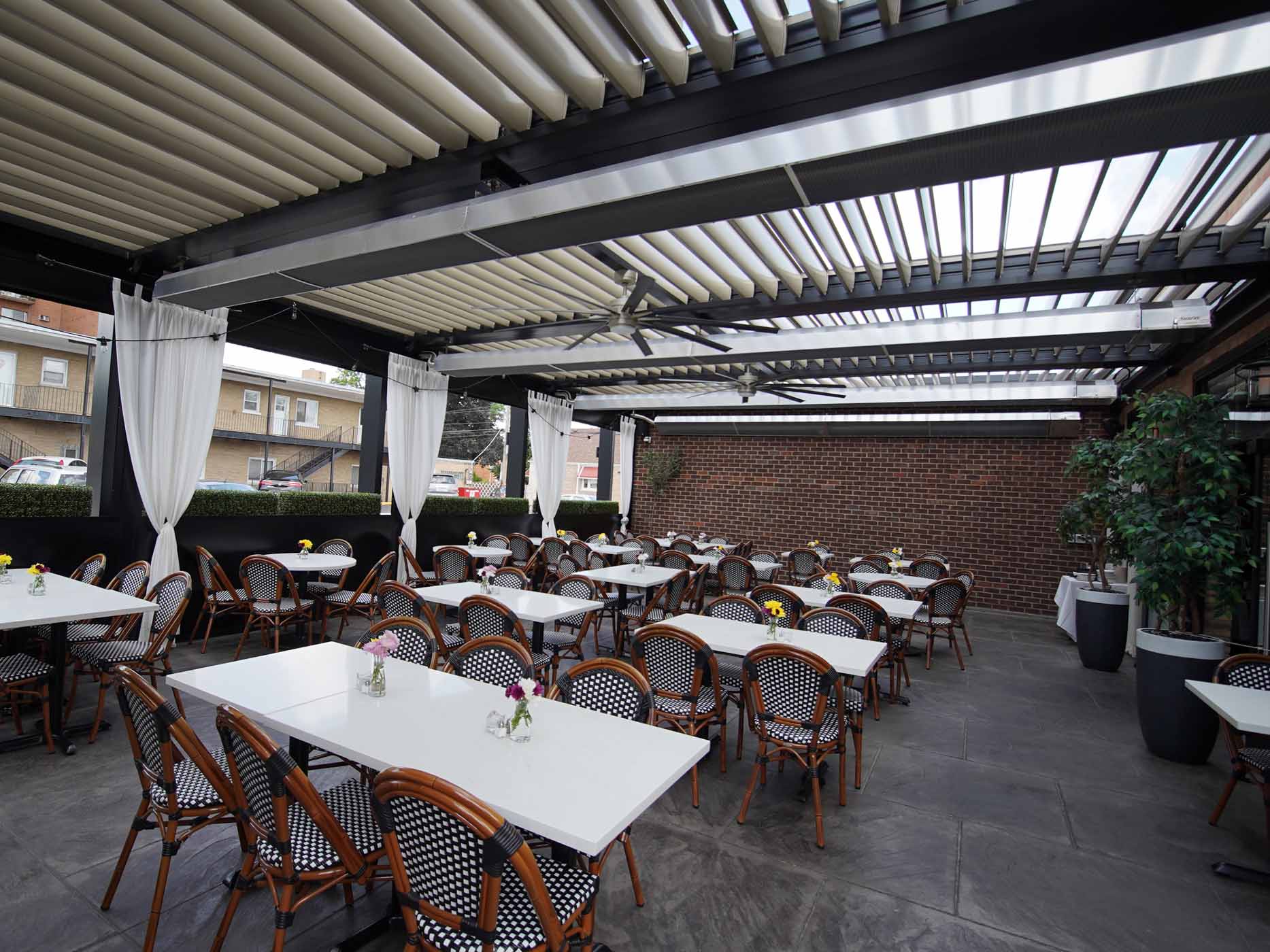 Patented infrared patio heaters over a patio with brown interior accents.