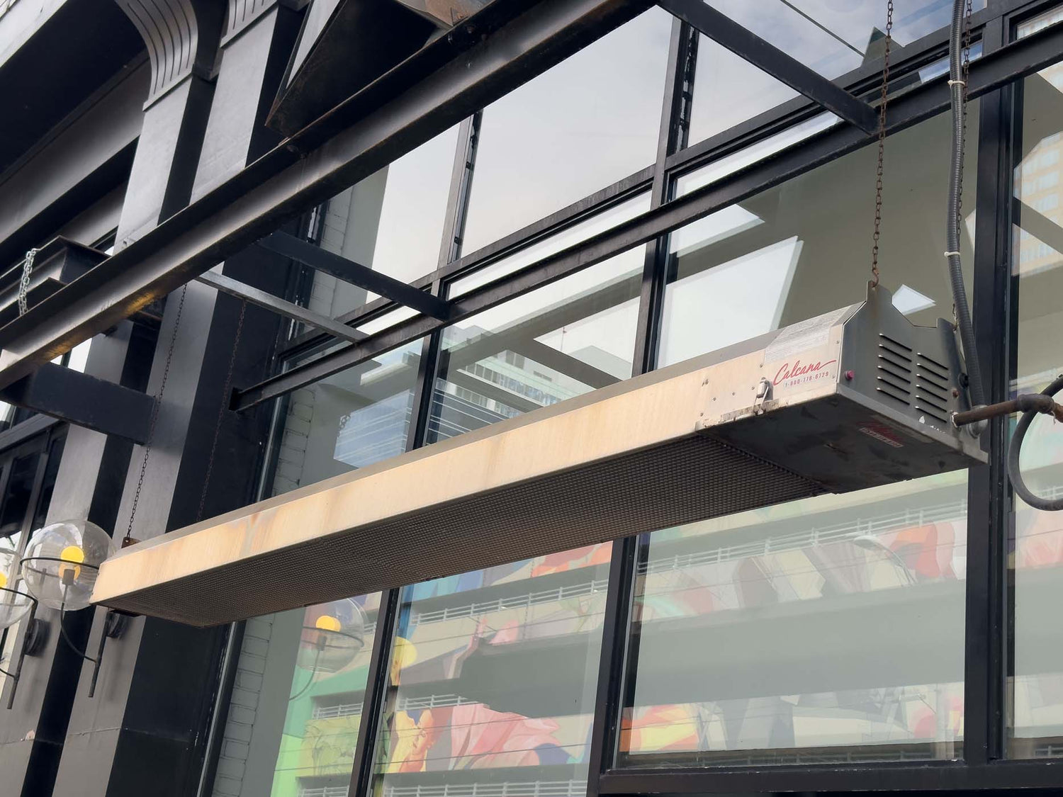 Single Heater Unit Hanging Outside National on 10th in Calgary