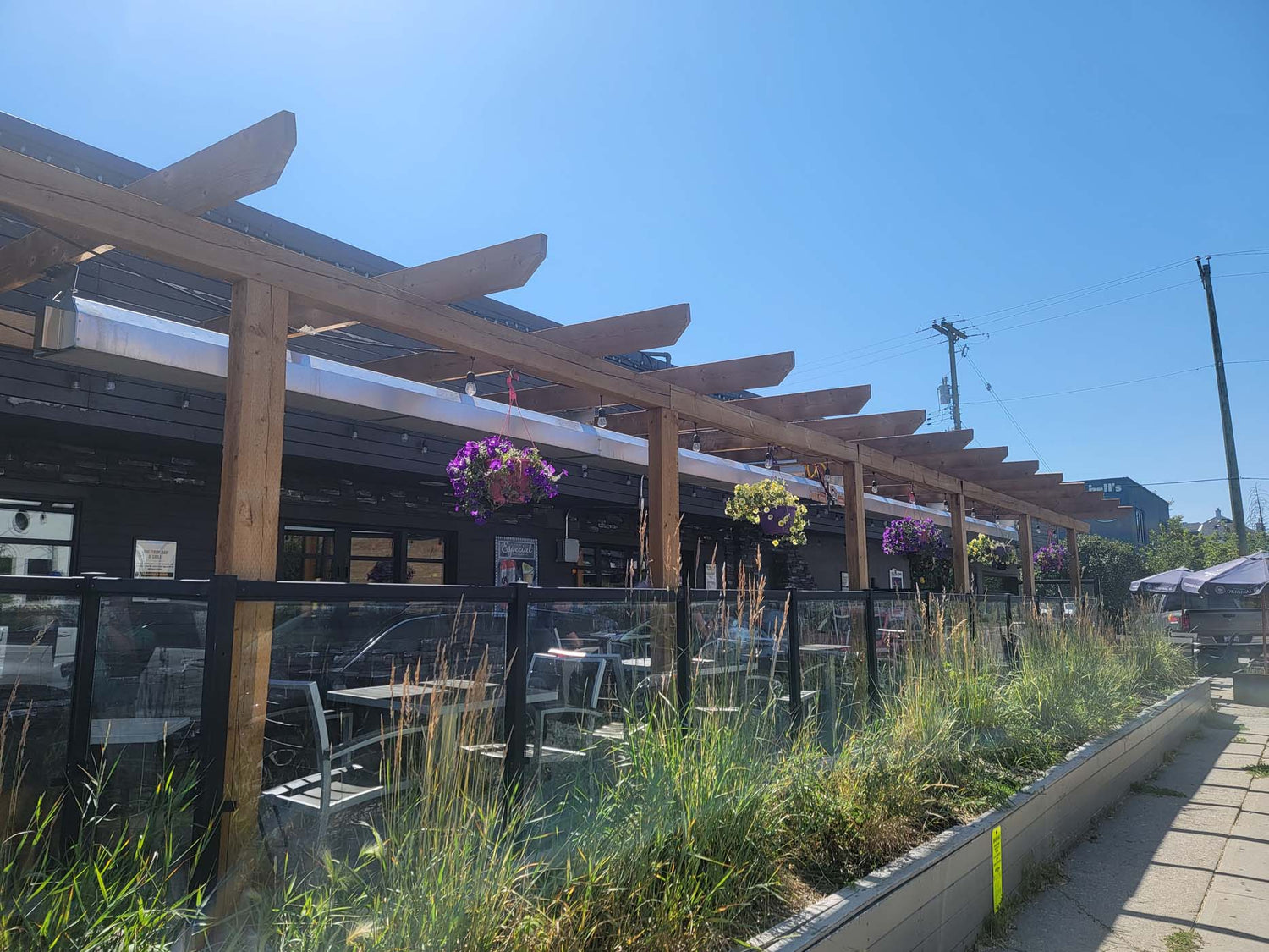 Series of Infrared Heaters on Decorated Patio at The Trop in Calgary