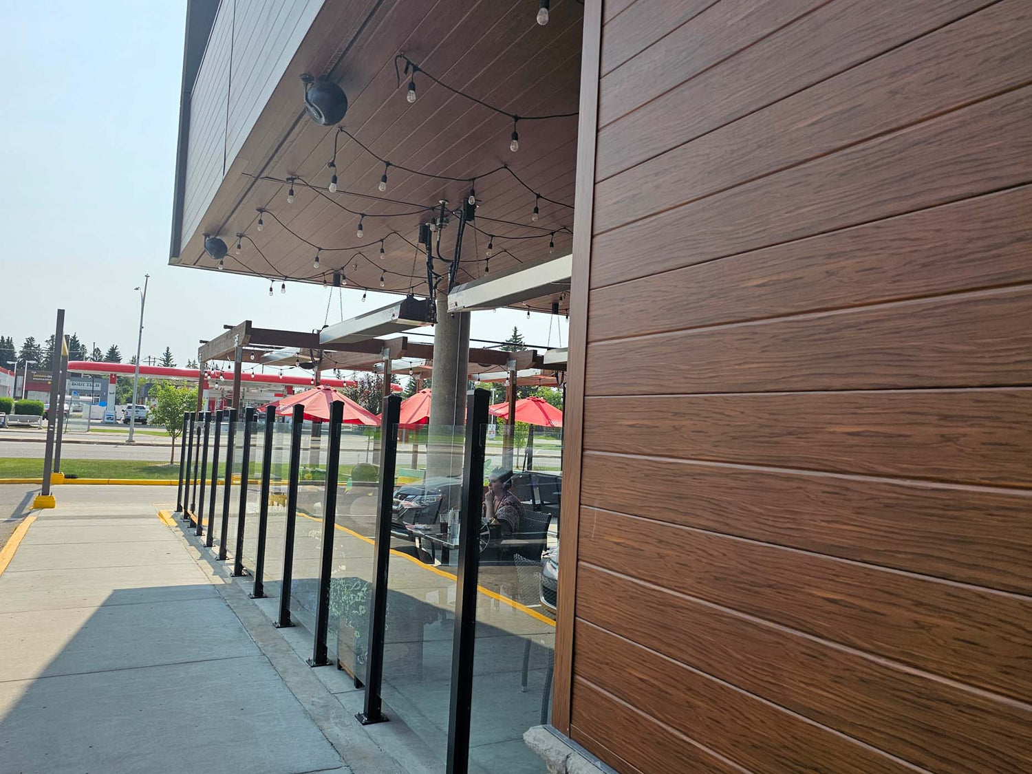 Infrared patio heater warming a restaurant patio with radiant heat