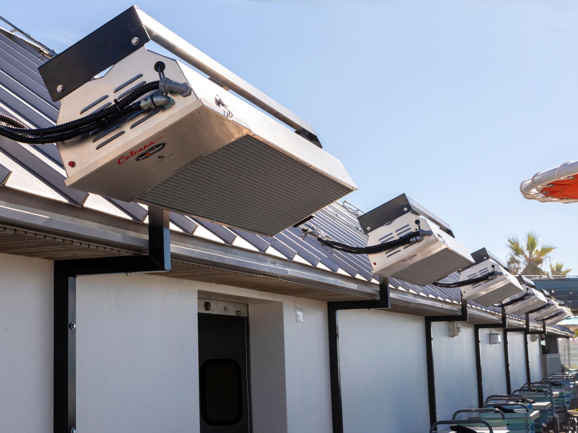 Infrared Patio Heaters Set Lining Wall