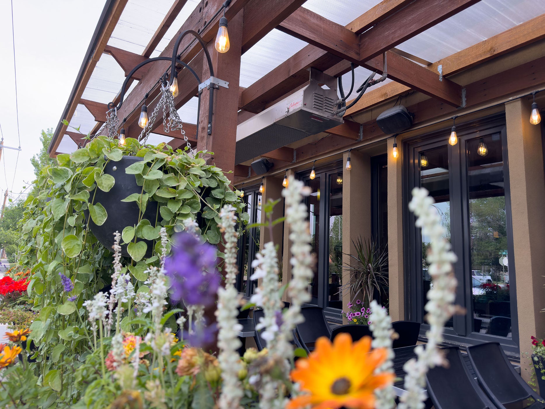 Infrared Patio Heater Close to Flowers and Greenery