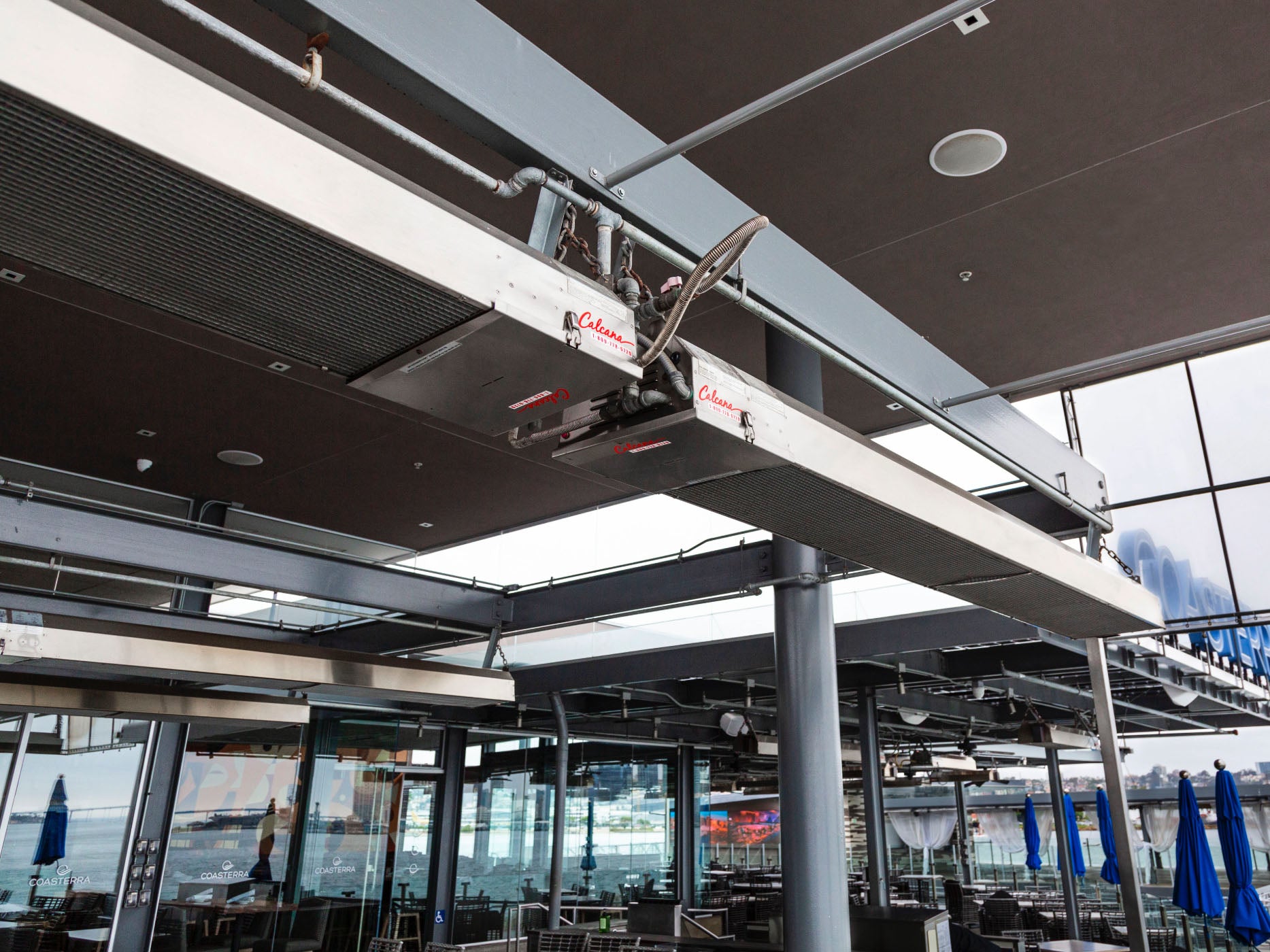 Infrared Patio Heaters at a Coastal Restaurant keeping patio warm