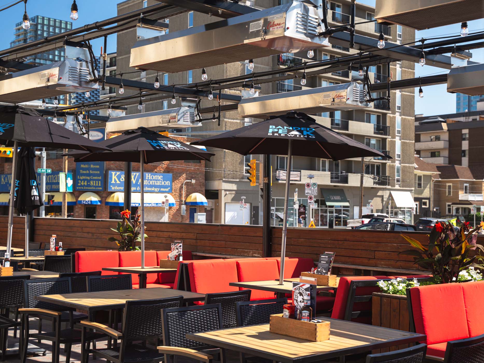 Set of Infrared Patio Heaters Warming Patio at Elephant & Castle in Calgary