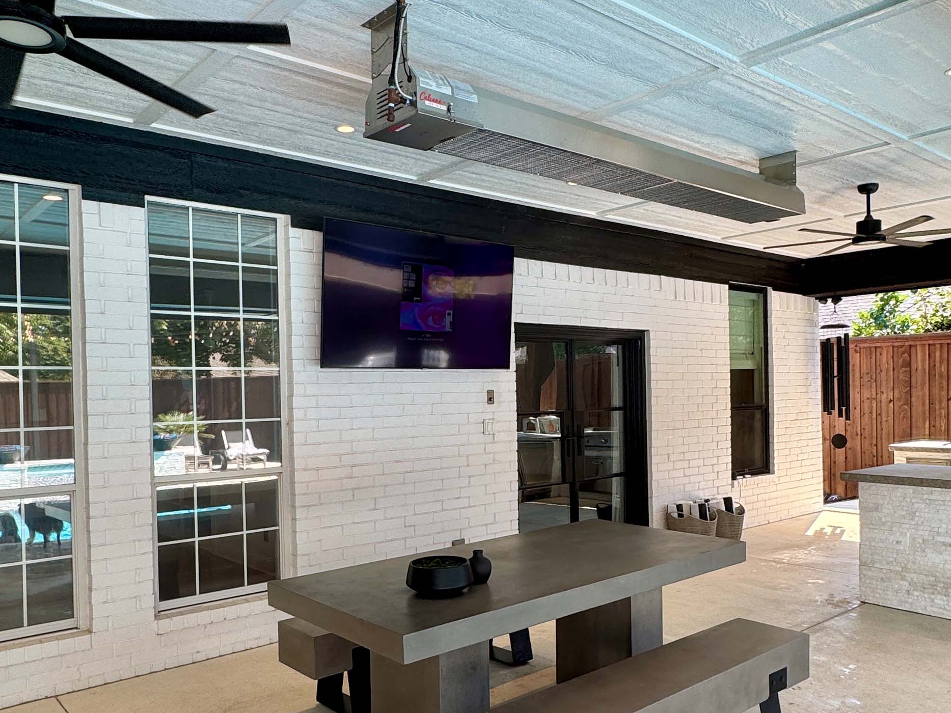 Poolside Infrared Patio Heater by Outdoor Bar, Table, & TV