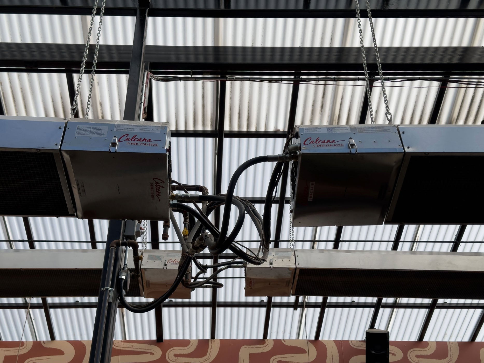 Close up of two sets of Infrared Patio Headers with emphasis on burner heads